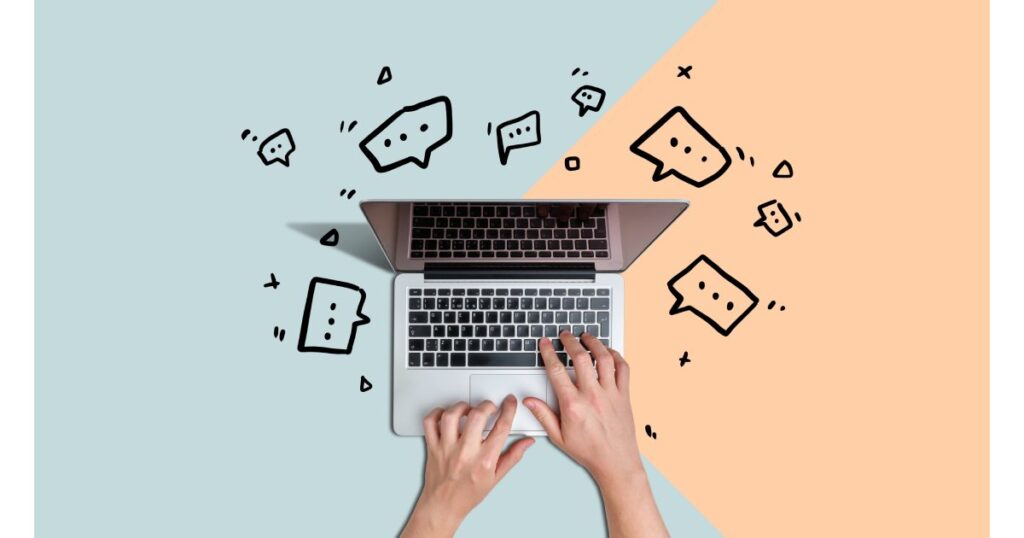persona che utilizza il computer ed icone in primo piano